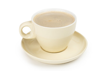 Image showing small white cup of cappuccino coffee on light background