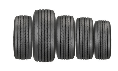 Image showing Column of tires isolated on the white background