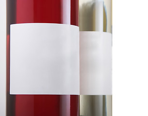 Image showing Red, Green and White wine bottles.