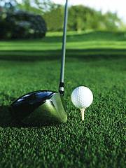 Image showing Close up of golf ball on a tee