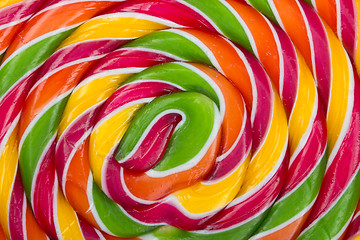 Image showing lollypop, twirly abstract background