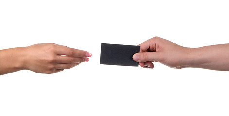 Image showing Businessman's hand holding blank paper business card