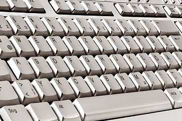 Image showing Keyboard of a notebook computer. White and black.