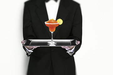 Image showing Manhattan Cocktail Being Served by Waiter on Silver Tray