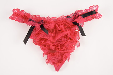 Image showing a sexy red garter on a white background