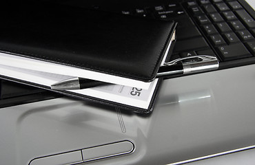 Image showing laptop and Notebook