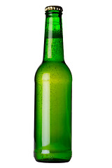 Image showing Green bottle with liquid