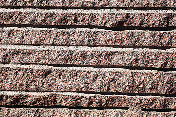 Image showing closeup of surface reddish granite block