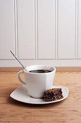 Image showing Coffee Cup with brownie - portrait view