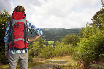 Image showing Hiker admiring a view