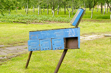 Image showing Retro blue rusty postbox with names on it 