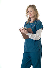 Image showing Attractive nurse holding a chart