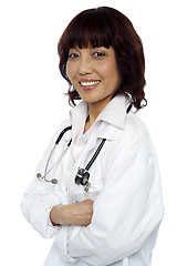 Image showing Smiling medical expert posing with arms crossed