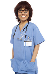 Image showing Relaxed female surgeon posing casually