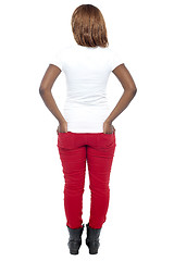 Image showing Rear view of african model. Hands in her back pocket