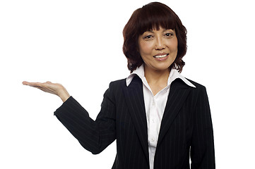 Image showing Asian business lady presenting copy space