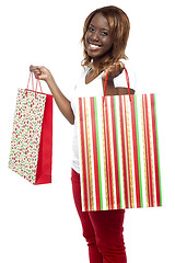 Image showing Sale Sale Sale... Woman carrying shopping bags