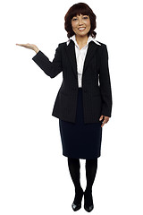 Image showing Businesswoman presenting copy space