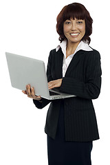 Image showing Portrait of a businesswoman working on laptop