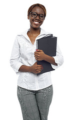 Image showing Female representative posing with file folder