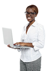 Image showing Female executive typing on laptop and working