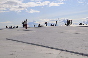 Image showing People on top of Oslo´s opera house