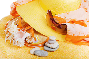 Image showing Beach  items a hat, a towel and slippers, it is isolated on whit