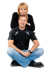 Image showing Beautiful couple in love sitting in the lotus position