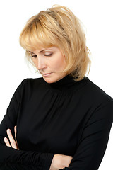 Image showing portrait of a girl dressed in black, sad looks away