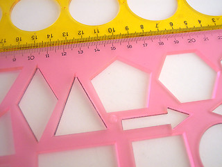 Image showing pink and yellow stencils