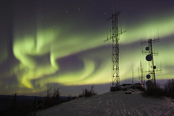 Image showing Northern lights above antennas