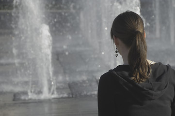 Image showing Girl watching fountain