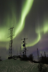 Image showing Two antennas under two aurora arcs