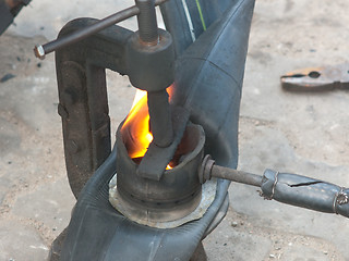 Image showing Repair of motorbike inner tube