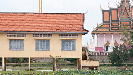 Image showing School building and temple in Cambodia