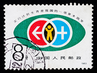 Image showing A stamp printed in China shows the family plan policy