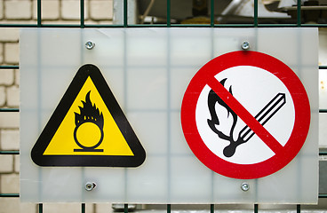 Image showing Fire warning signs compressed oxygen gas cylinders 