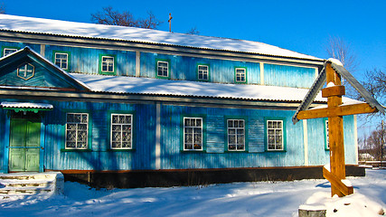 Image showing Long rural church in winter