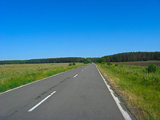 Image showing The asphalted road and the blue sky