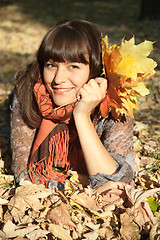 Image showing woman with autumn leaves 