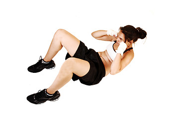 Image showing Girl doing sit-ups.