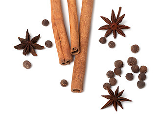 Image showing Black peppercorns, anise stars and cinnamon sticks