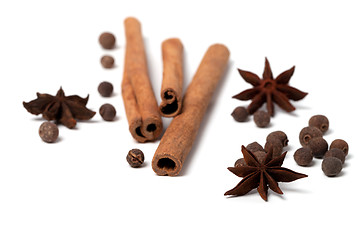 Image showing Black peppercorns, anise stars and cinnamon sticks