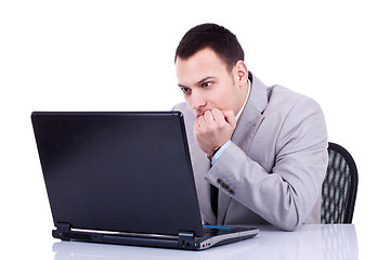 Image showing looking at laptop 