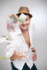 Image showing money flying player