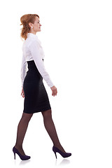Image showing young business woman is walking
