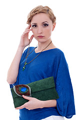 Image showing  woman holding purse and necklace