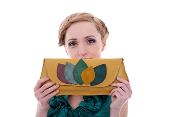 Image showing beautiful  girl holding a purse