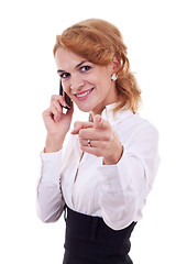 Image showing woman on mobile phone pointing 