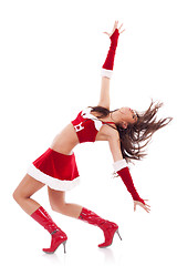 Image showing dancing woman in Christmas outfit 